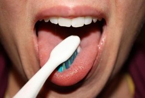 your-tongue:-to-brush-or-not-to-brush?-–-dr.-judson-wall